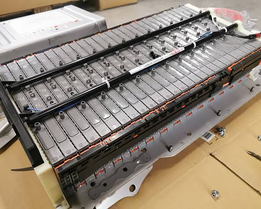 Professional hybrid battery replacement work with expert technicians ensuring quality and reliability.