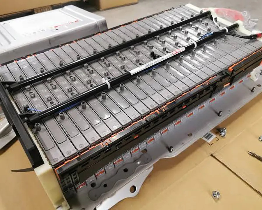 Professional hybrid battery replacement work with expert technicians ensuring quality and reliability.